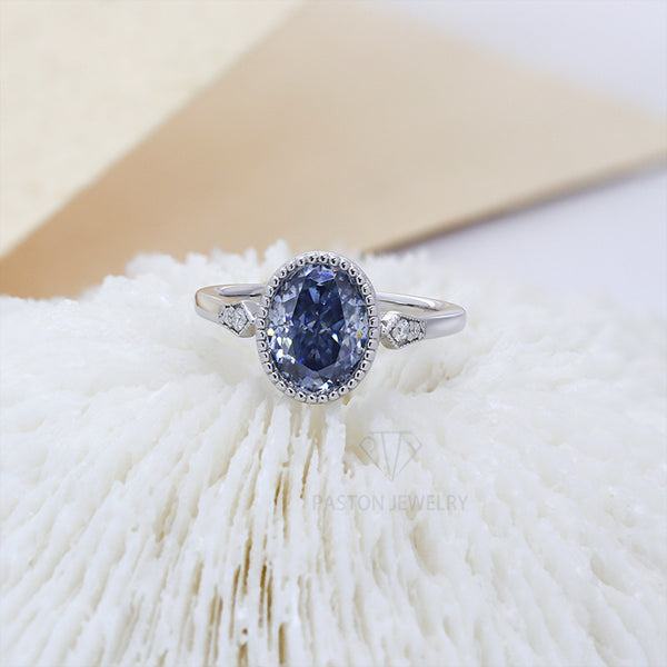 R00624-Paston Custom 7x9mm 2ct Blue Oval Moissanite Ring
