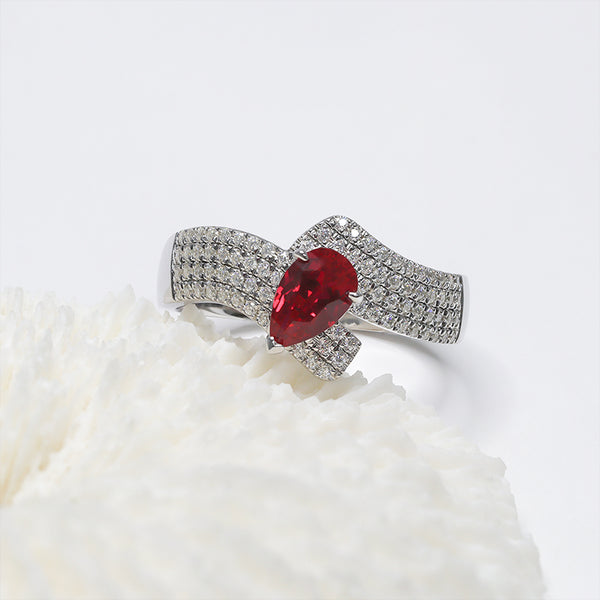 R00410-5x8mm Lab Grown Pear Ruby Ring With Moissanite Side Stones